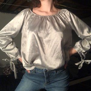 Metallic stripped blouse with bows on sleeves